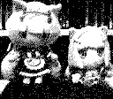 The same plushies, taken with a Game Boy Camera, shown in very low resolution and only four shades of grey.